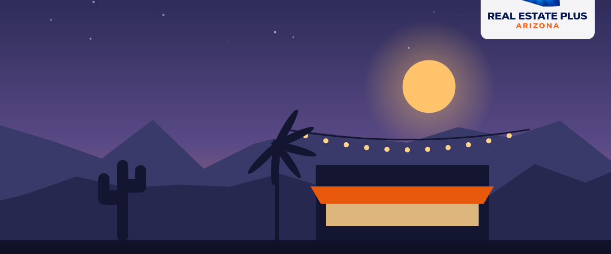 Pub storefront with string lights at dusk โ Real Estate Plus Arizona