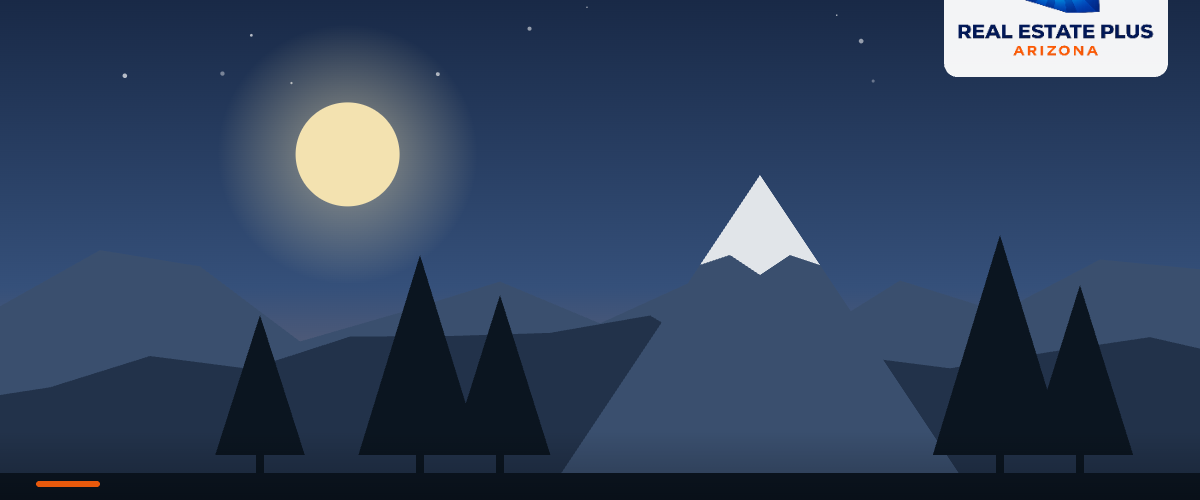 Flagstaff pines and snowy peak at dusk — Real Estate Plus Arizona