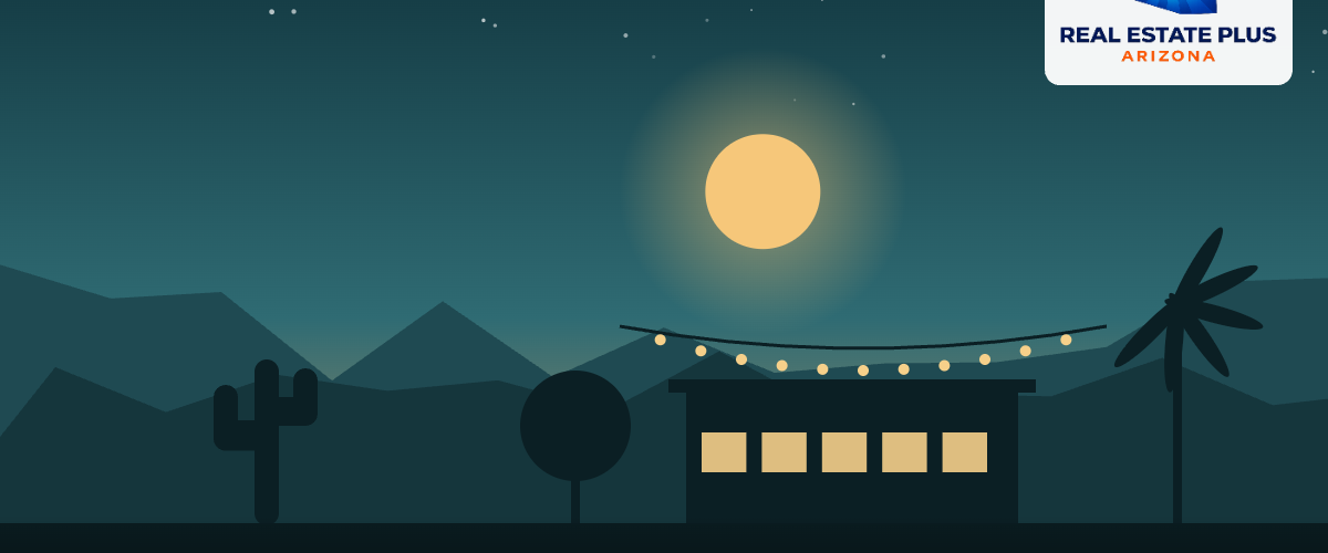 Restaurant patio with string lights at dusk — Real Estate Plus Arizona