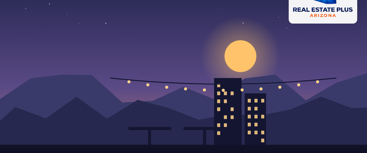 Outdoor dining under string lights in Phoenix — Real Estate Plus Arizona